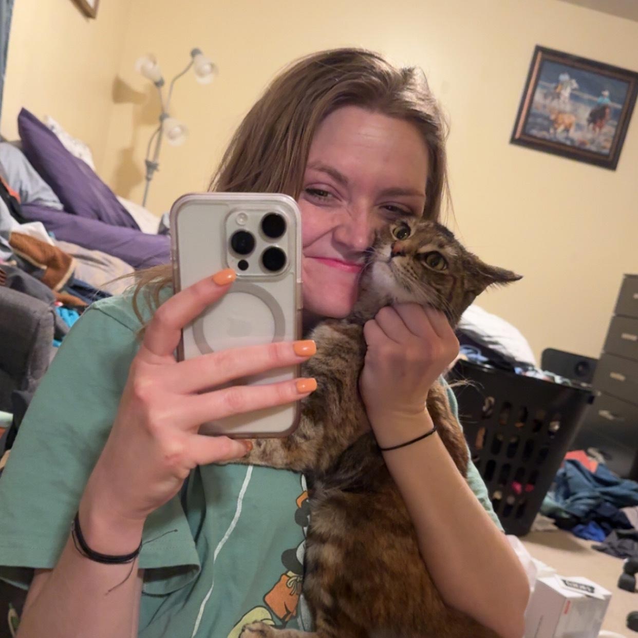 katya-lifestyle-with-minerva Katya snuggling with her cat, Minerva McGonagall